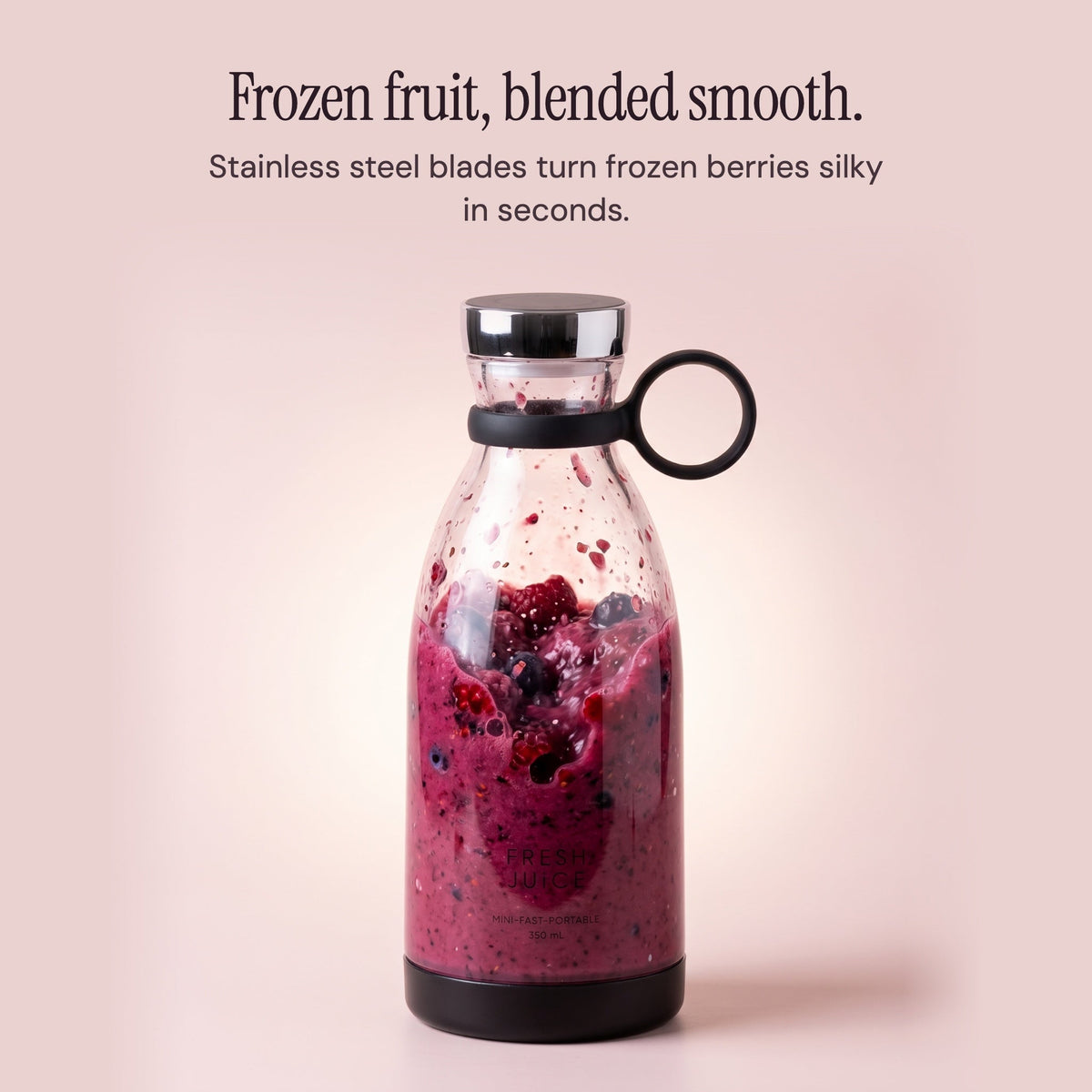 Frozen berries blending smooth inside the Black Swirlette.
