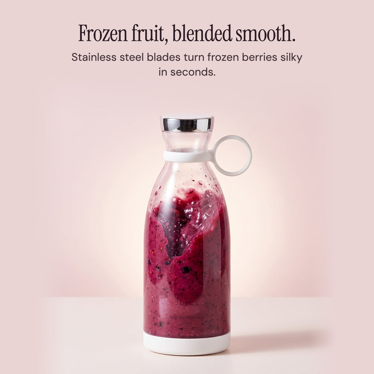 Frozen berries blending smooth inside the White Swirlette.