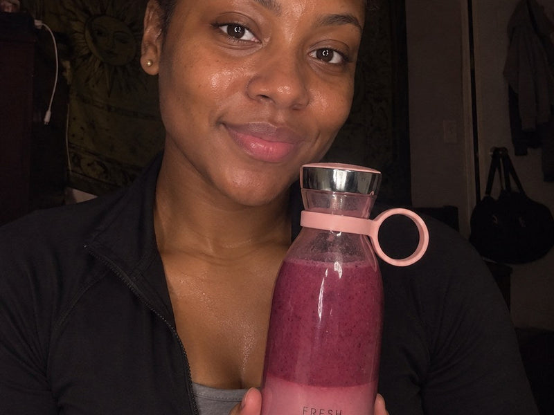 Megan smiling with her Swirlette after the gym.