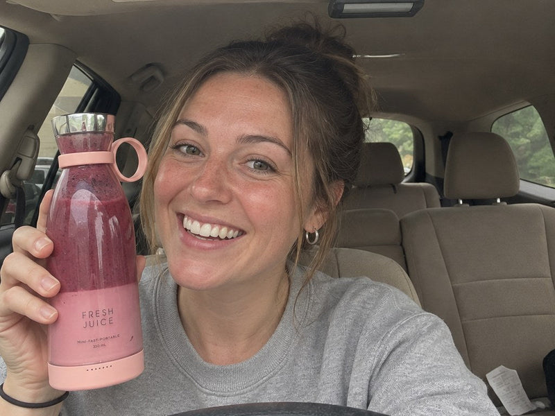 Vanessa laughing in her car with her Swirlette.